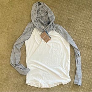 Patagonia tropic comfort hoodie with neck tie and pocket.